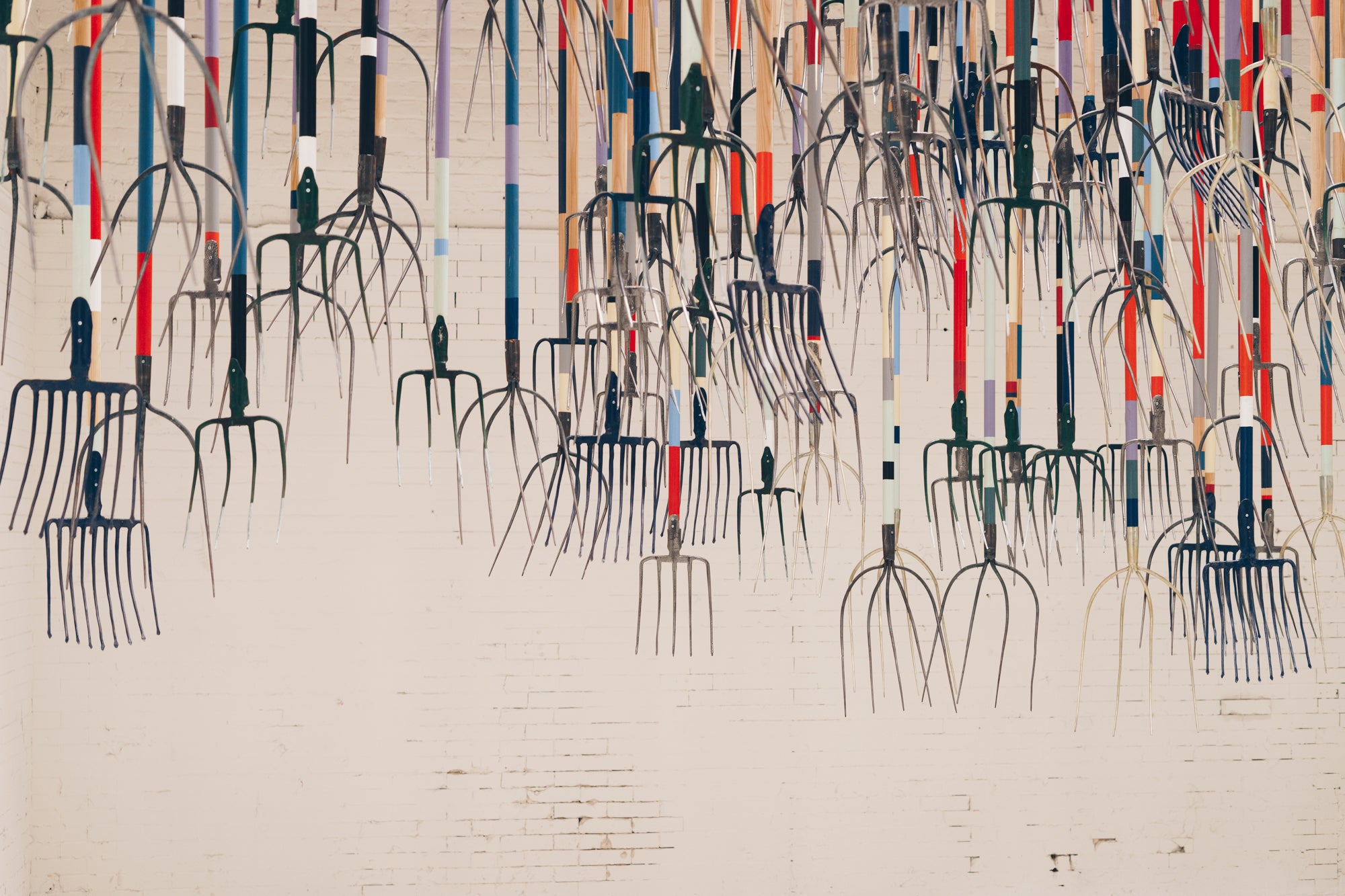 The Crusher Simon Birch 300 pitchforks hanging from the ceiling at 14th factory LA