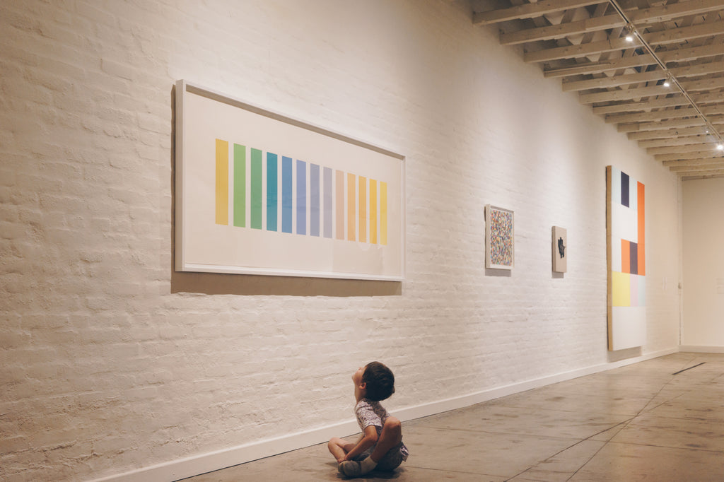 child looking at Ellsworth Kelly at Underground Museum in LA
