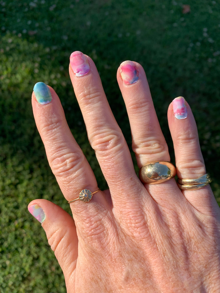 Janna Conner watercolor nail art stickers and gold stacking rings