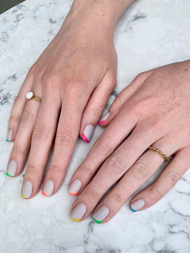 matte rainbow nail art and Janna Conner rings