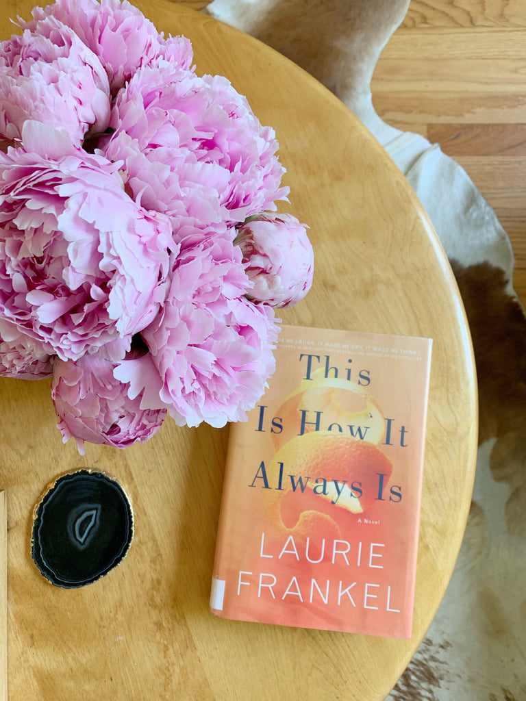 This is how it always is book by Laurie Frankel on coffee table with peonies