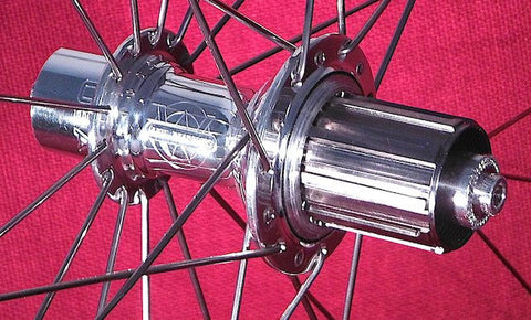 Image of White Industries T11 Polished Rear hub with Titanium 11 speed Shimano freehub.