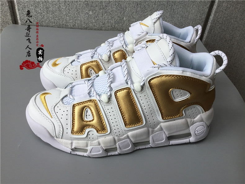 nike air uptempo oro