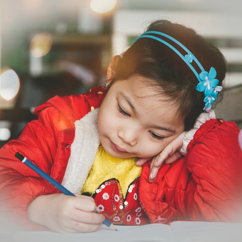 kids writing in their gratitude journal