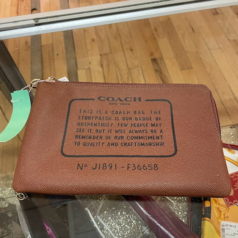 Coach NWT brown leather pouch
