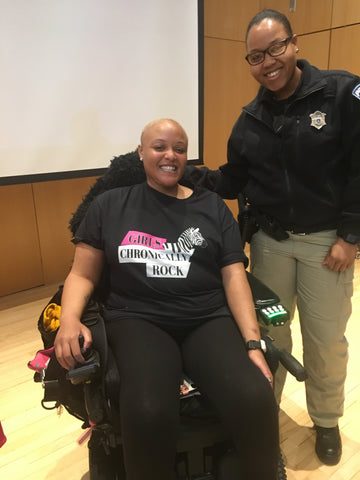 Keisha Greaves with person at Framingham State