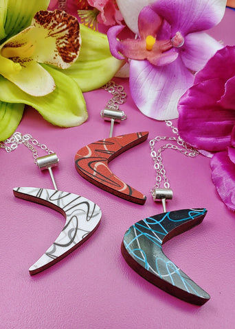 Boomerang laminate on wood and sterling silver necklaces