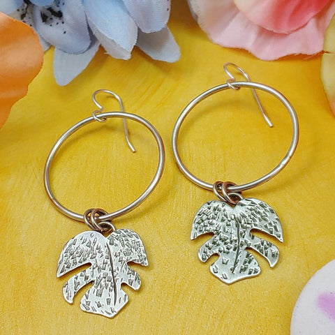 Sterling silver hoop with monstera leaf dangles