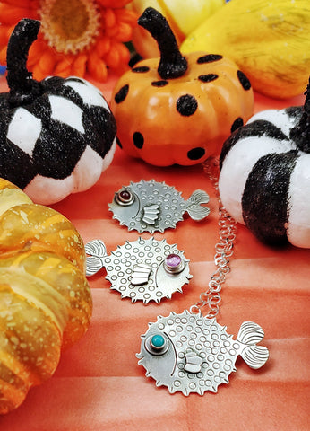 Sterling silver puffer fish necklaces and colorful pumpkins