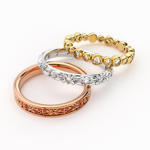 Rose gold, white gold, and yellow gold eternity bands