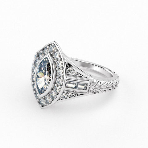 Christine Alaniz Designs antique marquise diamond engagement ring with a halo, baguettes and round diamonds down the shank, and leaf engraving