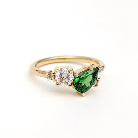 Christine Alaniz Designs green garnet and diamond cluster engagement ring