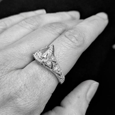 Christine Alaniz Designs - Antique-inspired pear diamond engagement ring with piercings and pavé