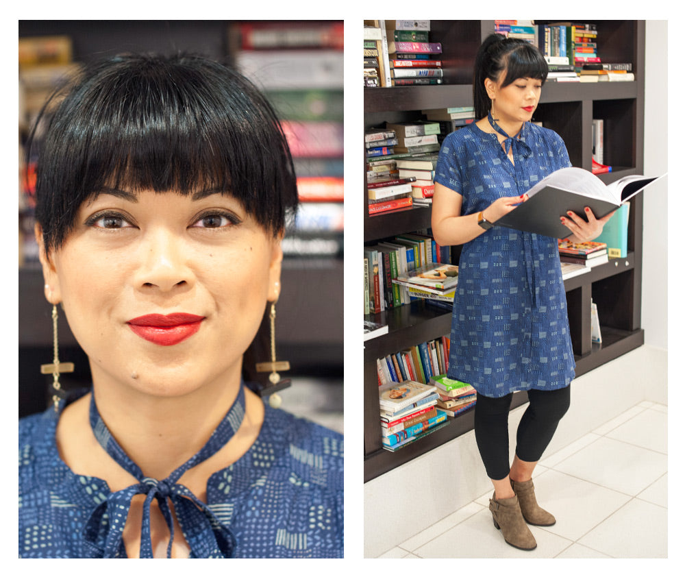 Bernadette wearing the Whidby Shirtdress in patchwork and the Raise the Bar earrings in gold.