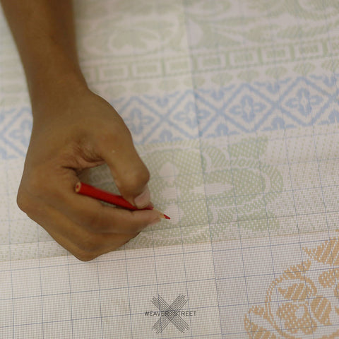 Designing process: Design transferring on graph, in making of Banarasi saree. Weaving Process by Weaver Street
