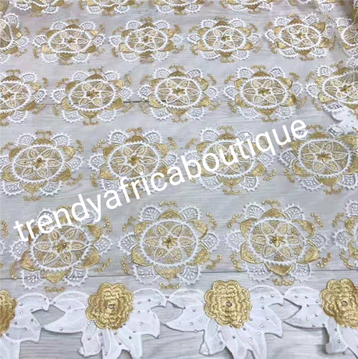 white and gold lace fabric