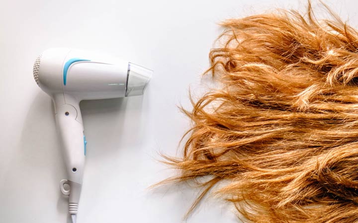 Damaged hair with with hair dryer