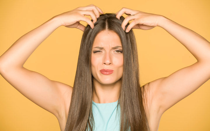 Woman holding hair 