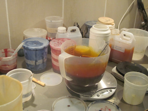 Jane Keith mixing up dyes in dye lab in prep for printing