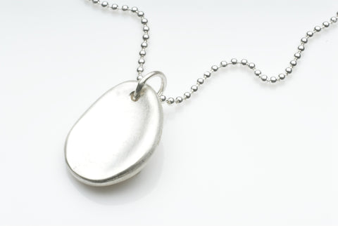 Worry Stone Pendant by Wyckoff Smith Jewellery at www.wyckoffsmith.com