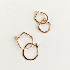 Gold hammered hoops by Michele Wyckoff Smith on www.wyckoffsmith.com