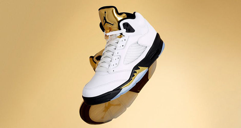 white and gold jordan 5