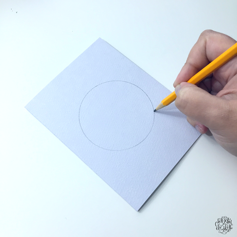 Drawing a circle on Kassa watercolor paper folded in half