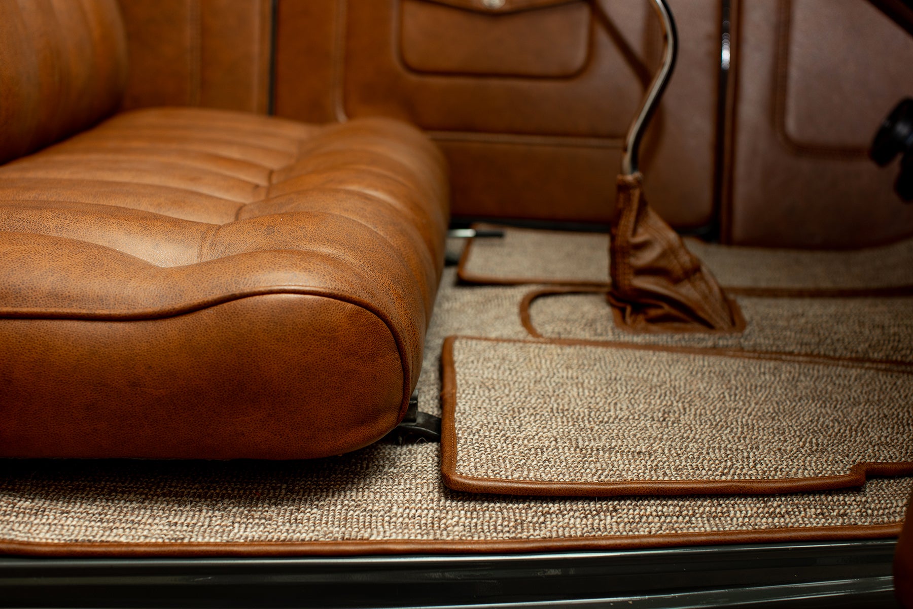 1932 Ford Roadster with Relicate Vintage Saddle Distressed Leather honey brown square weave carpet