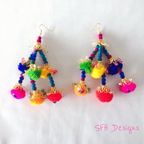 Brightly coloured pom pom earrings