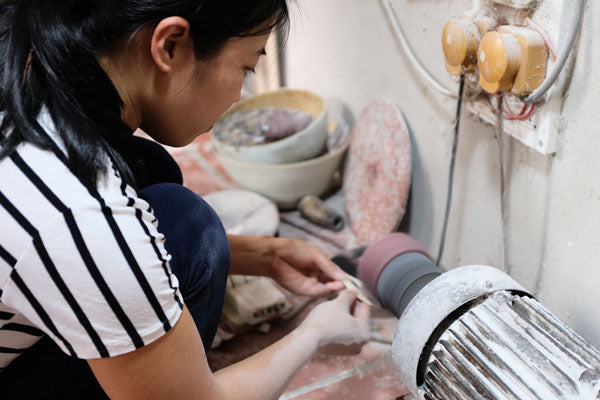 Vietnamese Girl Polishes Horn Jewelry Pieces