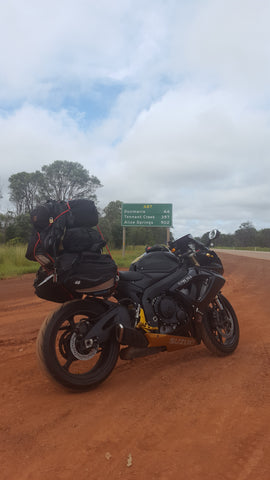 Three ways roadhouse heading to Alice Springs on motorcycle