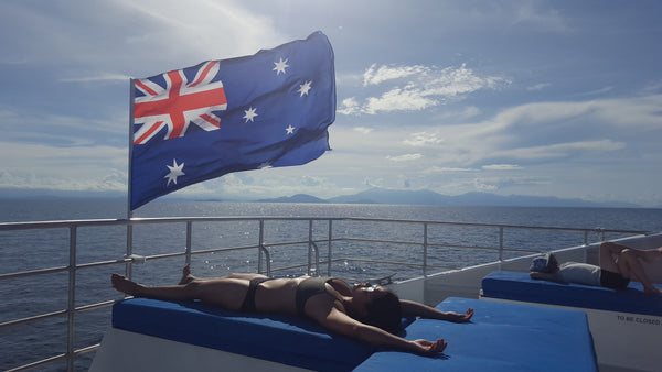 Traveling to the Great Barrier Reef by boat under the Australian Flag