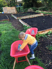 kids helping in the garden