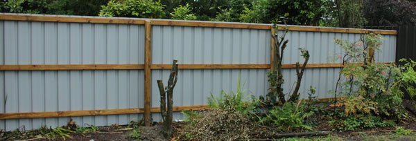 5-rib steel fence on wooden frame