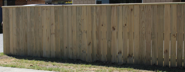 dressed board fence with cap