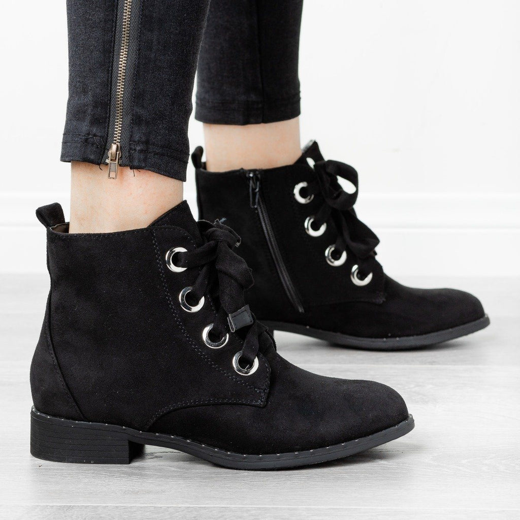 black lace up boots with studs
