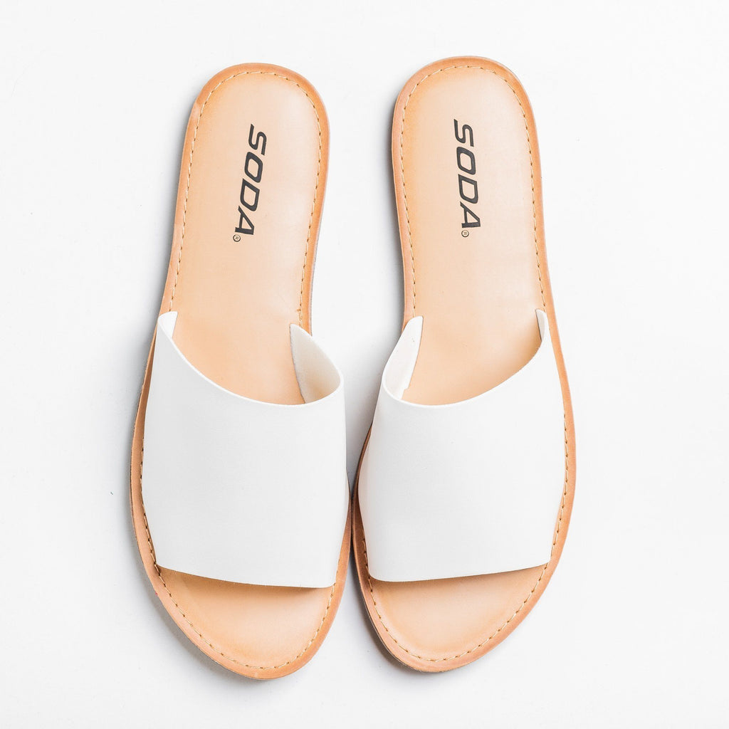 white slip on sandals