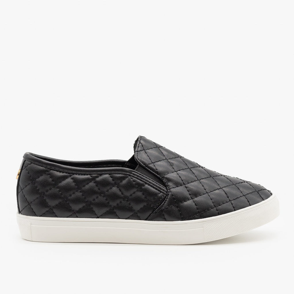 black quilted slip on shoes