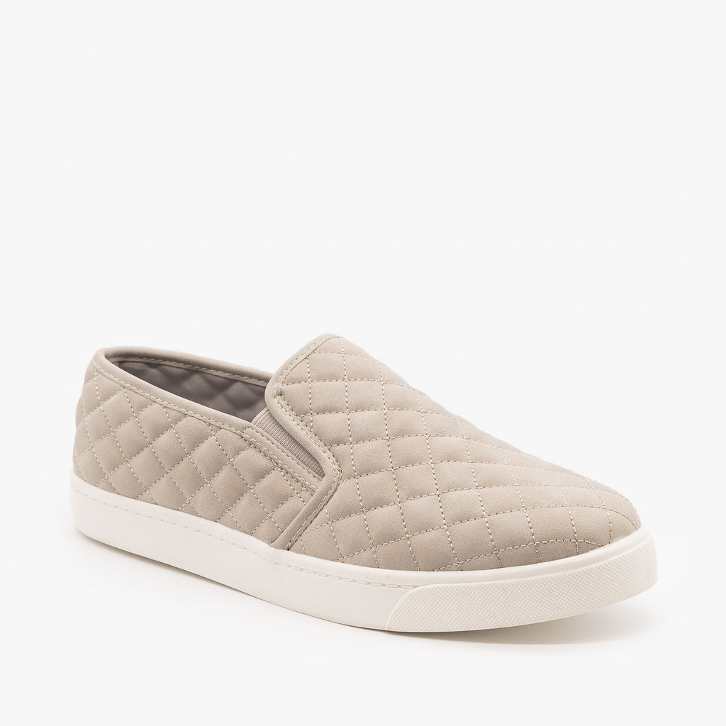 white quilted slip on shoes