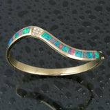 Opal bracelet with diamonds set in 14 karat gold