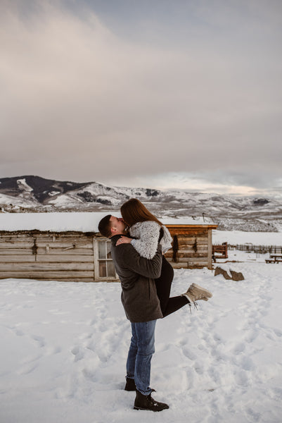 Couple kissing in the snow
