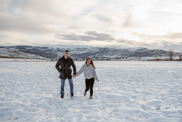 couple walking in the snow