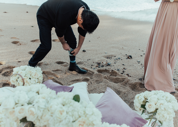 man proposing with sock