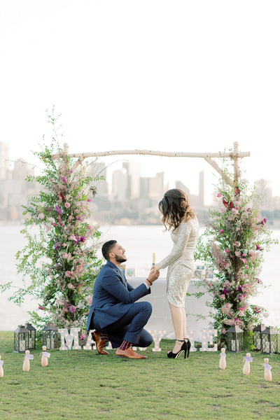 proposal in Seattle with thin engagement ring box 