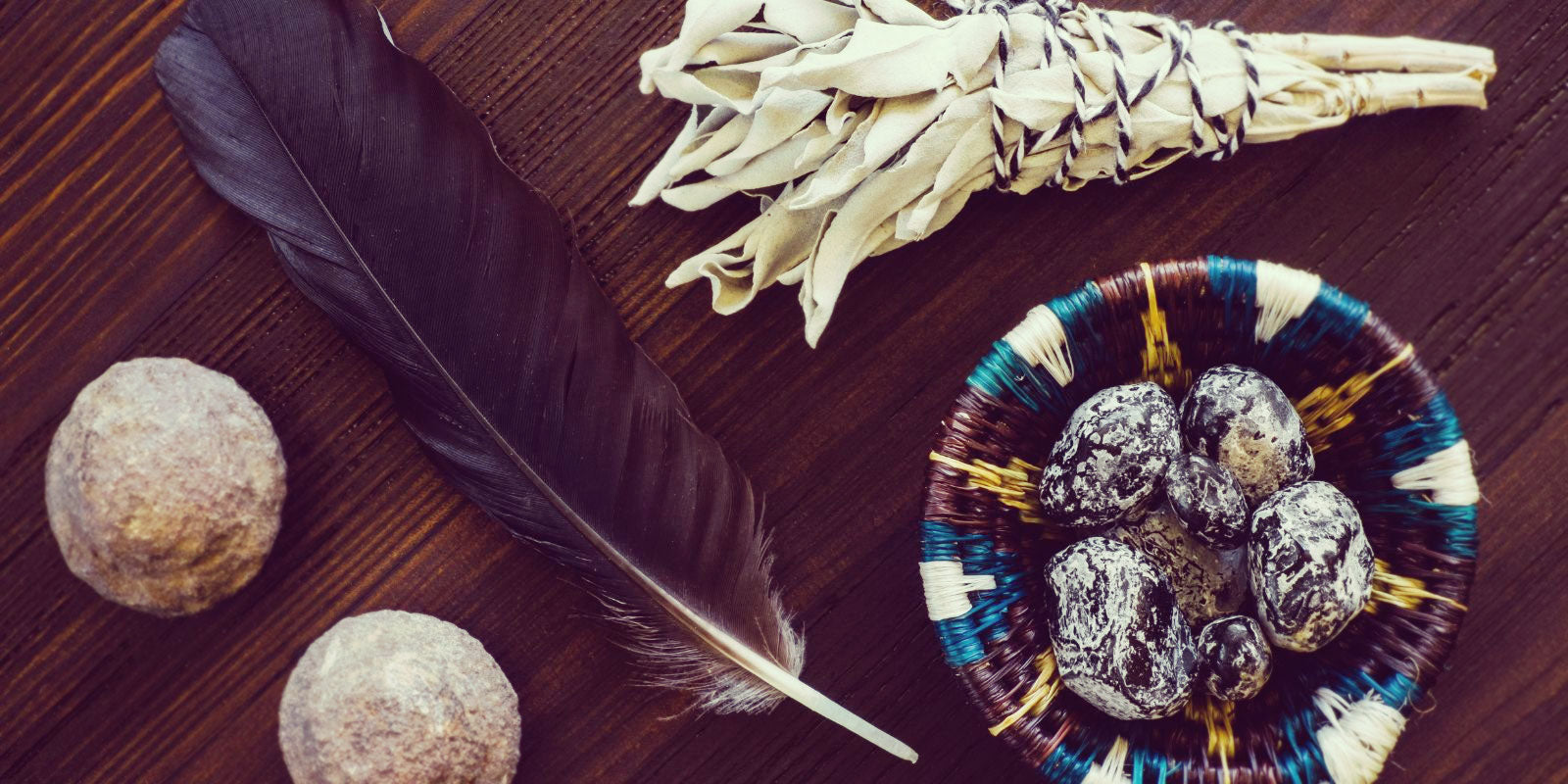 Feathers, stones, and sage.