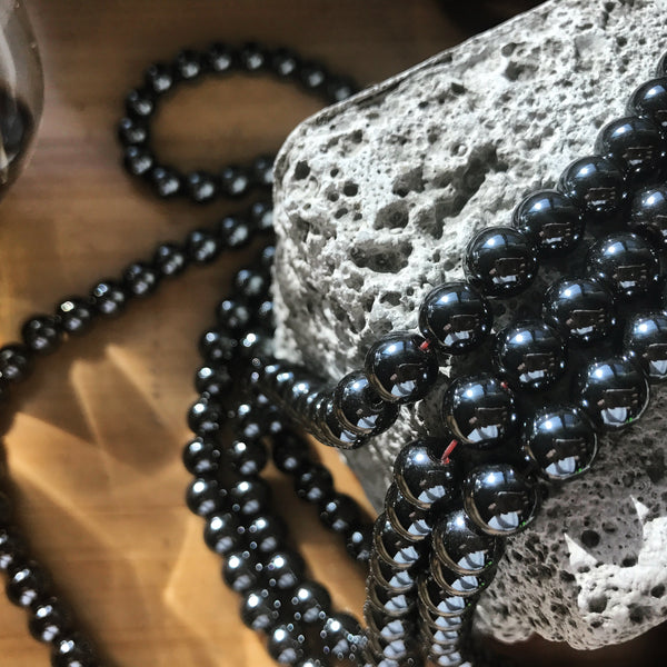 Hematite provides a protective grounding energy that evokes deep memory & thought. With all the traveling & work we do, it's comforting to keep this gem around us for extra stability.