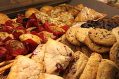 A tray of muffins pastries and cookies perfect for serving for brunch or continental breakfast