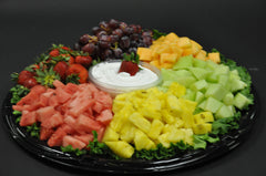Fruit tray premade with watermelon cantaloupe pineapple and grapes