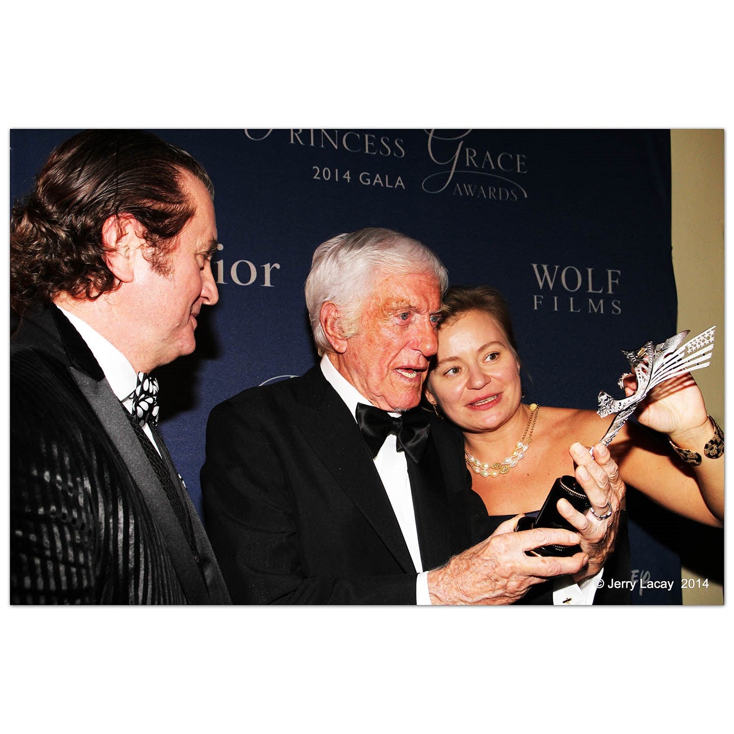 Alex & Maria Soldier presenting Dick Van Dyke with Princess Grace Award, designed and created by Alex Soldier. Jewelry: Alex Soldier. Dress: Alex Teih. Photo: Jerry Lacay.