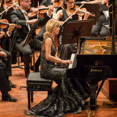 Classical pianist Olga Kern sporting Alex Soldier jewelry while performing at Carnegie Hall